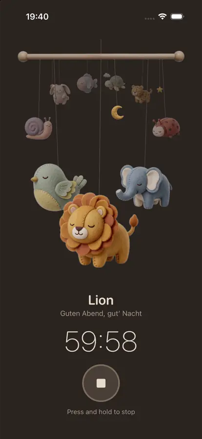 Screenshot of the app in night mode: the lion plays “Guten Abend, gut’ Nacht” and the timer shows 59:58.