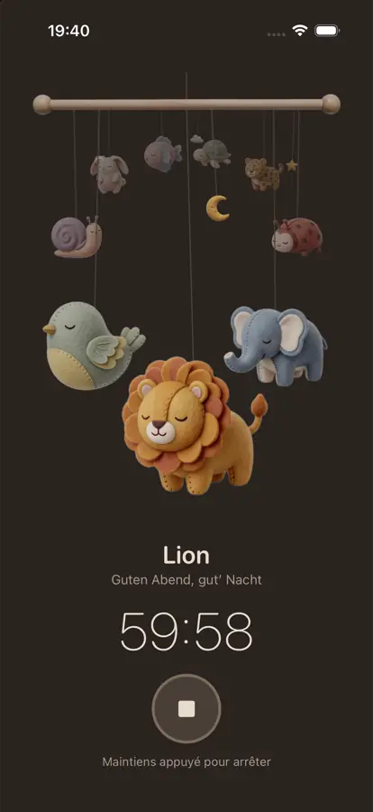 Capture d’écran de l’app en mode nuit : le lion joue « Guten Abend, gut’ Nacht », la minuterie affiche 59:58.